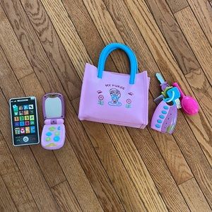 Child play purse with electronic accessories